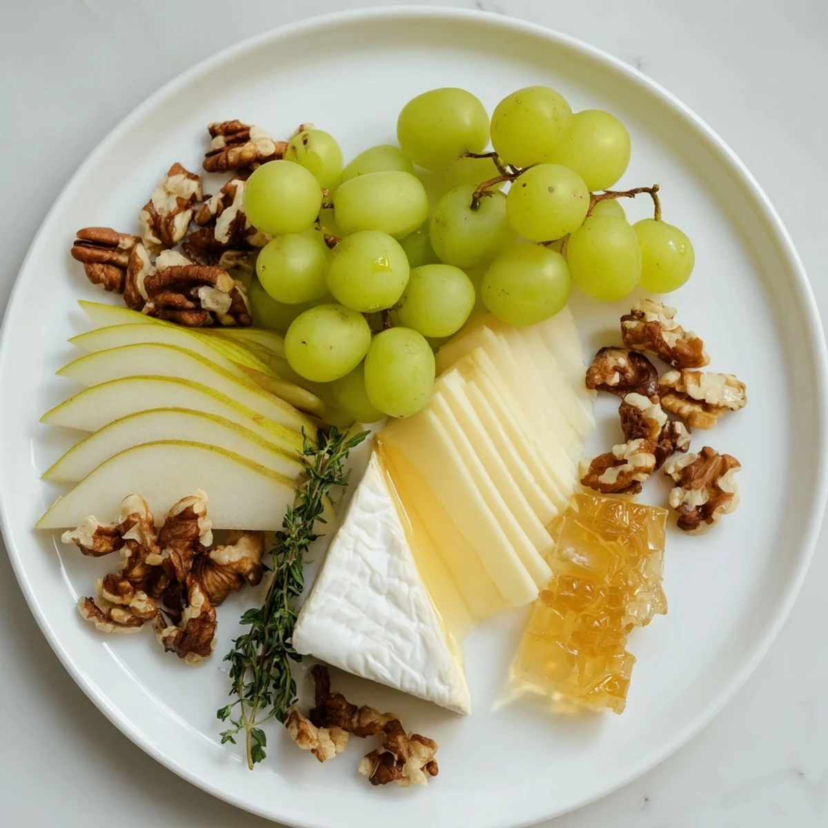 Vibrant Winter Solstice Board featuring Brie, figs, olives, and fresh fruit, ready to enjoy.
