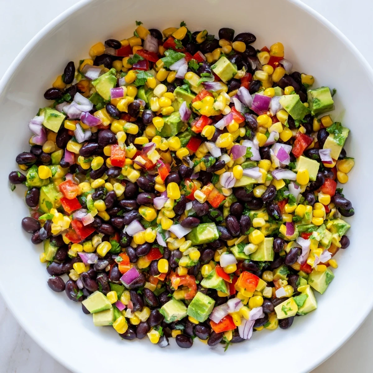 Brightly colored Southwest Black Bean Salad, showcasing the ingredients ready for a refreshing meal.