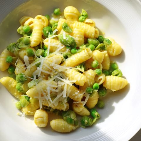 A close-up of Garlic Butter Ditalini featuring al dente pasta, melted butter and Parmesan cheese.