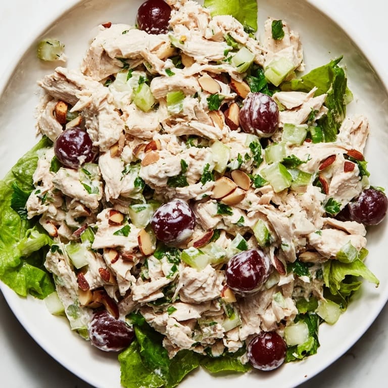 Close-up of a delightful crispy chicken salad, a refreshing mix of textures and flavors.