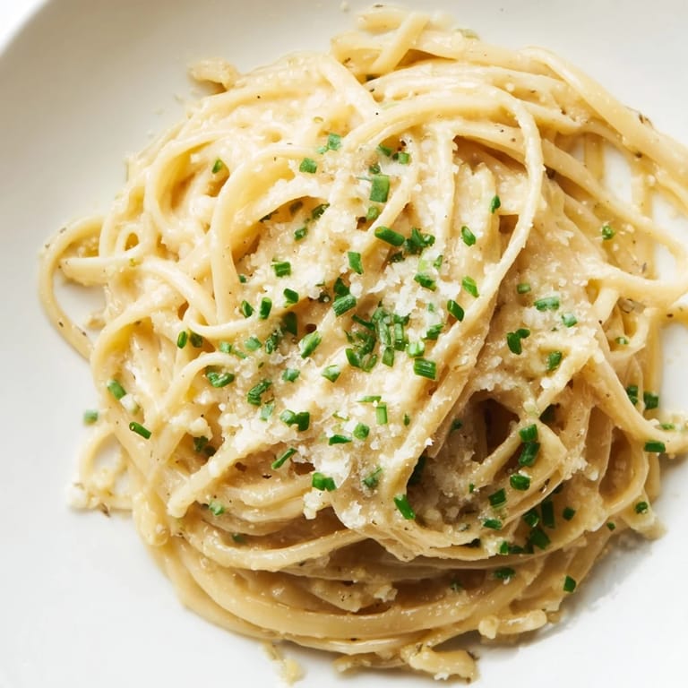 A close-up of Miso Butter Pasta shows perfectly coated noodles, promising a quick, savory meal.